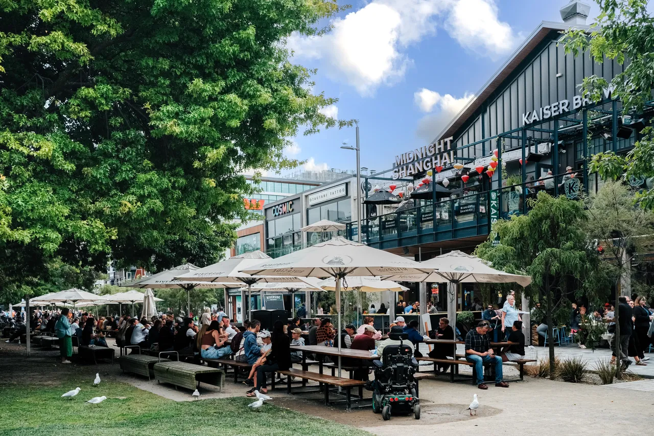 People dining outdoors at Riverside Market in central Christchurch